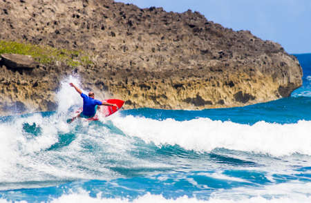 Surfing at Zipper Beach, arecibo, Puerto Rico.