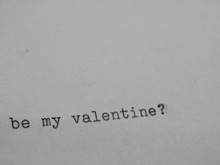 Old vintage typewriter typing "Be my Valentine"の写真素材