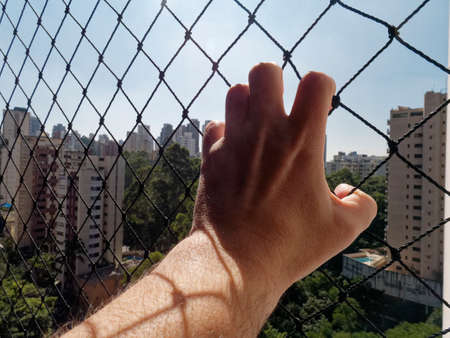 hand holding a safety net.の写真素材
