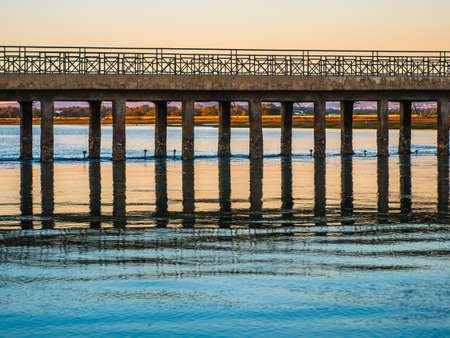 Colorful Sunset in a Bridge in Faro.の写真素材