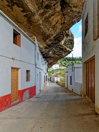 View of Streets and Houses on Rocks in Setenil de las Bodegas city.の写真素材