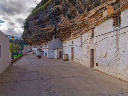 View of Streets and Houses on Rocks in Setenil de las Bodegas city.の写真素材