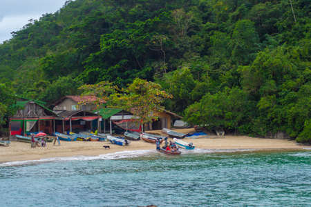 RIO DE JANEIRO, BRAZIL - JULY 27, 2015: View of a fishing village on Trindade Beach.のeditorial素材