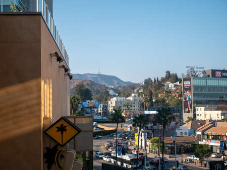 LOS ANGELES, USA - JUNE 28, 2016: Streets view with Hollywood sign in the background.のeditorial素材