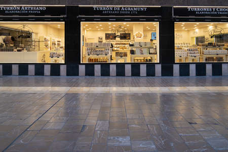 Malaga, Spain - February 23, 2021: View of Turron de Agramunt shop during the pandemic in Malaga.