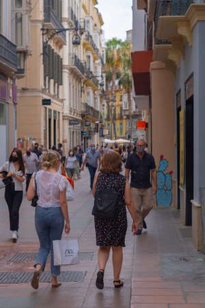 Malaga, Spain - June 19, 2021: People walking in the historic center of Malaga in Spainのeditorial素材