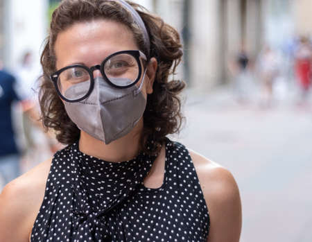 Young woman with face maskの写真素材