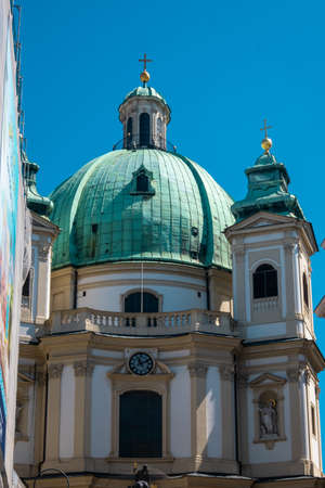 VIENNA, AUSTRIA - JULY 10, 2021: The Hofburg Palace in Vienna, ancient baroque imperial palace. Entrance of the Saint Michael wing in Michaelerplatz square.のeditorial素材