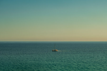 Beautiful view from a sailboat of Nerja beach in the Mediterranean seaの写真素材