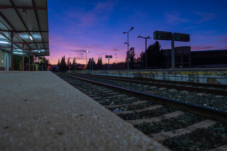 View of tracks at the train station in Ronda at night.