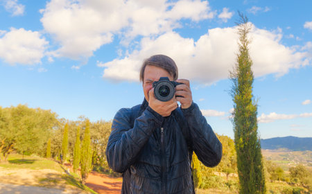 A photographer taking a picture of himself
