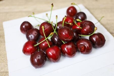 bunch of cherries on a table