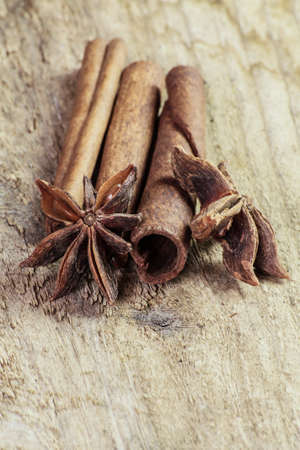 cinnamon and star anise on a wooden background