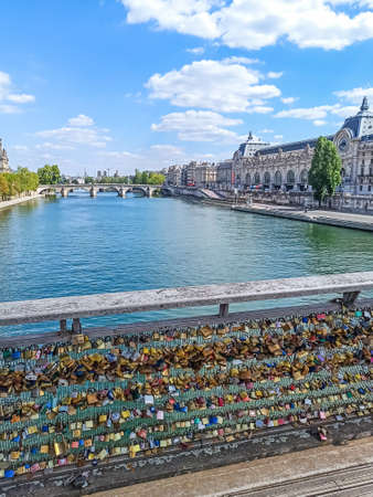 padlocks attached to the LÃ©opold-SÃ©dar-Senghor footbridge