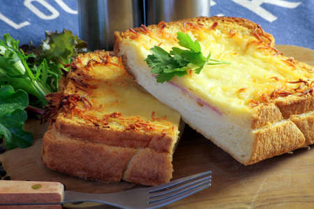croque-monsieur with bÃ©chamel sauce on a table