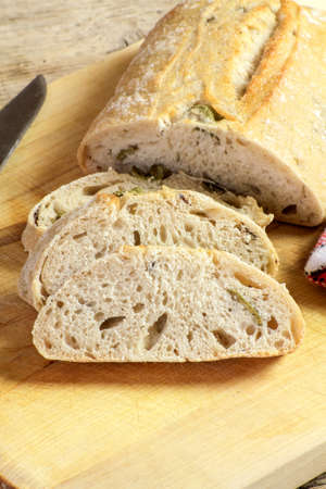 ciabatta bread sliced on a table