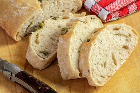 ciabatta bread sliced on a table