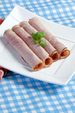 slices of white ham on a table