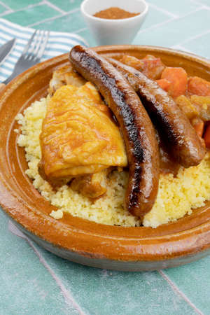 couscous dish with vegetables, chicken and merguezの写真素材