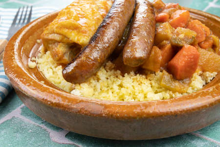 couscous dish with vegetables, chicken and merguezの写真素材