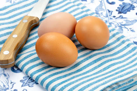 raw eggs on a kitchen towel