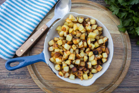 dish of hash browns on a tableの写真素材