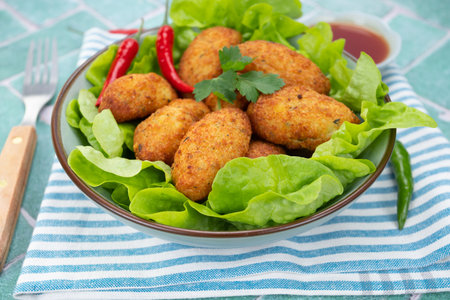 cod fritters in a dishの写真素材