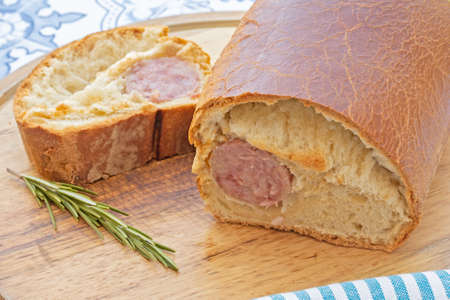 Lyonnais brioche sausage on a cutting boardの写真素材