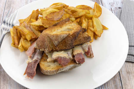 ham and cheese sandwich and fries