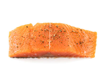 raw trout steak isolated on a white backgroundの写真素材