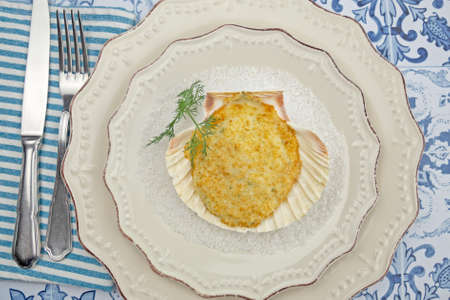 scallop and seafood cooked in a plateの写真素材