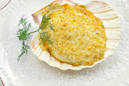 scallop and seafood cooked in a plateの写真素材