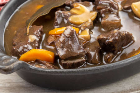 French dish "beef bourguignon" on a tableの写真素材