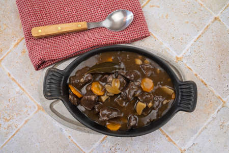 French dish "beef bourguignon" on a tableの写真素材