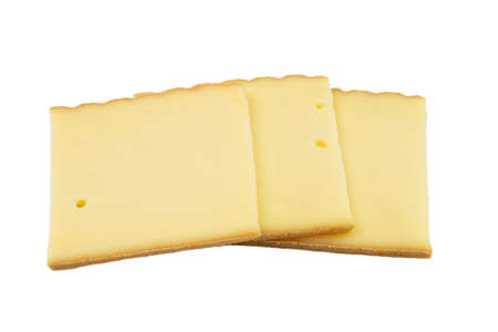 slices of cheese raclette isolated on white backgroundの写真素材