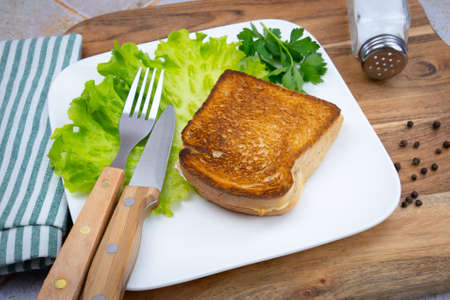 French hot sandwich croque-monsieur composed of bread, cheese and ham