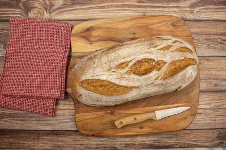 loaf of bread on a cutting board