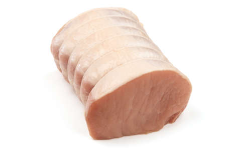 whole pork roast on a white baseの写真素材