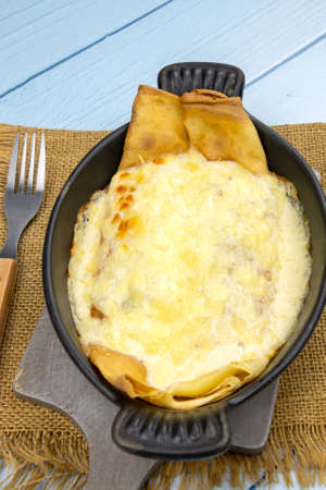 pancakes stuffed with mushroom and hamの写真素材