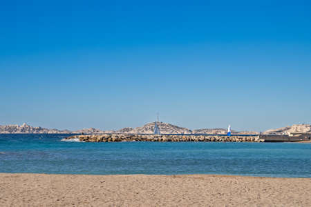 sailing boat seen from the Prado beach in Marseilleの写真素材