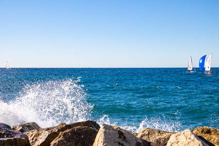 waves splashing at rocky shore of Mediterranean Sea, Prado beach, Marseille, Franceの写真素材