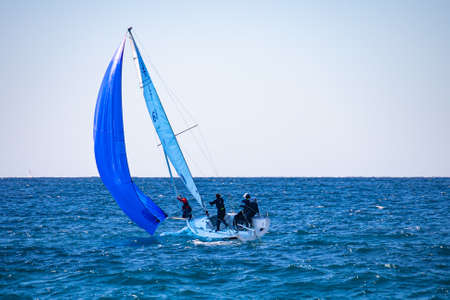 sailing boat seen from the Prado beach in Marseilleの写真素材