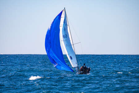 sailing boat seen from the Prado beach in Marseilleの写真素材