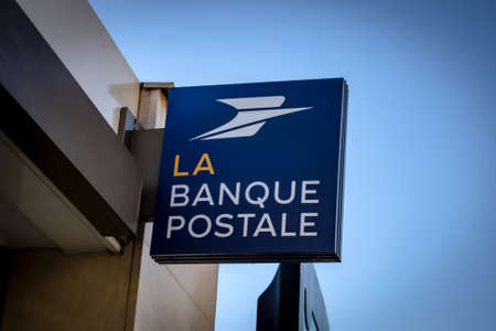 sign with the logo of the postal bank in Franceのeditorial素材