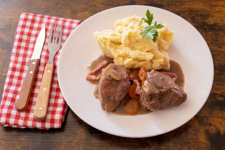 top view of rooster with mash on a plateの写真素材