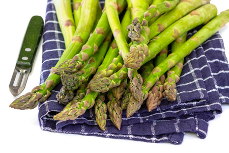 fresh green asparagus isolated on white backgroundの写真素材