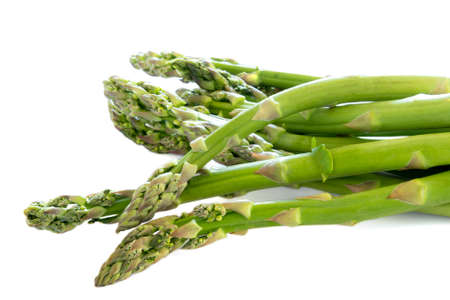green asparagus isolated on a white backgroundの写真素材