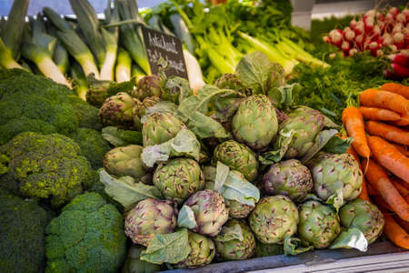 stall of fresh vegetables in a marketの写真素材