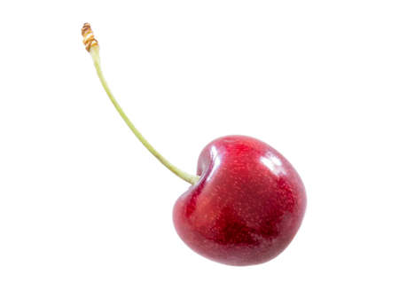 red cherry isolated over white backgroundの写真素材
