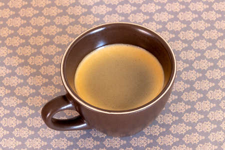 cup of black coffee isolated on a tableの写真素材